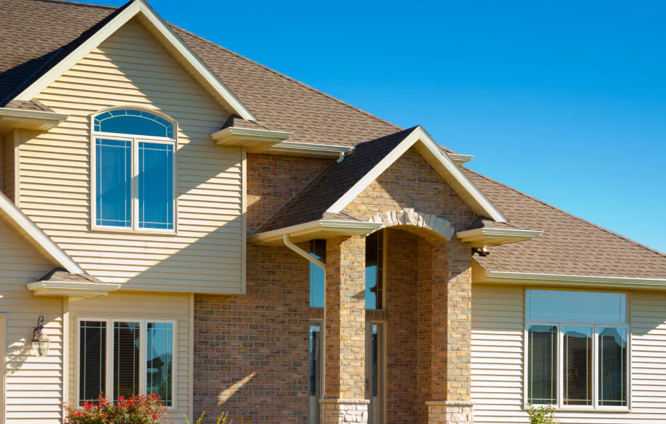 residential house with asphalt roofing